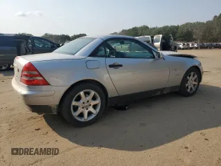 1999 Mercedes-Benz SLK-Class with VIN WDBKK47F9XF127582, listed as a Copart auction lot 71345494 with 187,302 mi miles and Salvage Title. Bid and sale history available at carsss.com. Image 3.