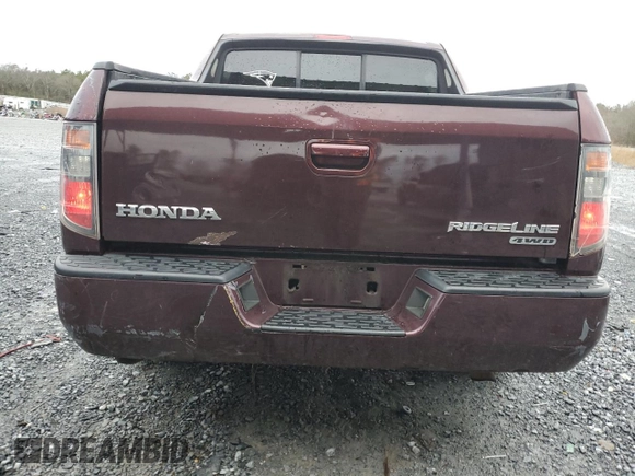 2007 Honda Ridgeline RTL z VIN 2HJYK16517H527441, wystawiony jako Copart lot #41366205 z przebiegiem 266 566 mil mil oraz Szkoda całkowita • Salvage title. Historia ofert i sprzedaży dostępna na DreamBid. Obrazek 6.