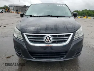 2013 Volkswagen Routan SE z VIN 2C4RVABGXDR724928, wystawiony jako Copart lot #54795185 z przebiegiem 147 652 mil mil oraz Szkoda całkowita • Salvage title. Historia ofert i sprzedaży dostępna na DreamBid. Obrazek 5.