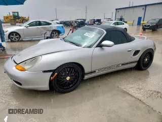 2002 Porsche Boxster S with VIN WP0CB29802S660218, listed as a Copart auction lot 62540525 with 129,940 mi miles and Salvage title. Bid and sale history available at DreamBid. Image 1.