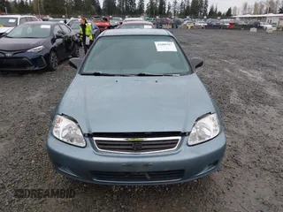 2000 Honda Civic LX with VIN 1HGEJ6677YL000793, listed as a IAAI auction lot 41889317 with 184,766 mi miles. Bid and sale history available at carsss.com. Image 13.
