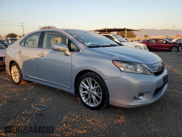 2010 Lexus HS 250h with VIN JTHBB1BA1A2013228, listed as a Copart auction lot 83495514 with 139,723 mi miles and Salvage Title. Bid and sale history available at DreamBid. Image 4.