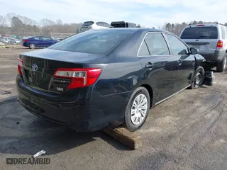 2013 Toyota Camry Hybrid LE with VIN 4T1BD1FK7DU068821, listed as a IAAI auction lot 41838227 with 159,808 mi miles. Bid and sale history available at carsss.com. Image 4.