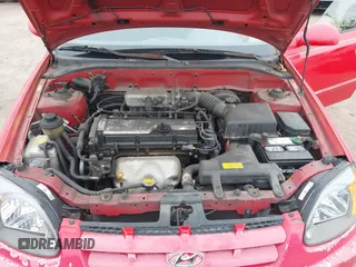 2005 Hyundai Accent GLS with VIN KMHCG45CX5U614083, listed as a IAAI auction lot 41006582 with 72,516 mi miles. Bid and sale history available at carsss.com. Image 10.