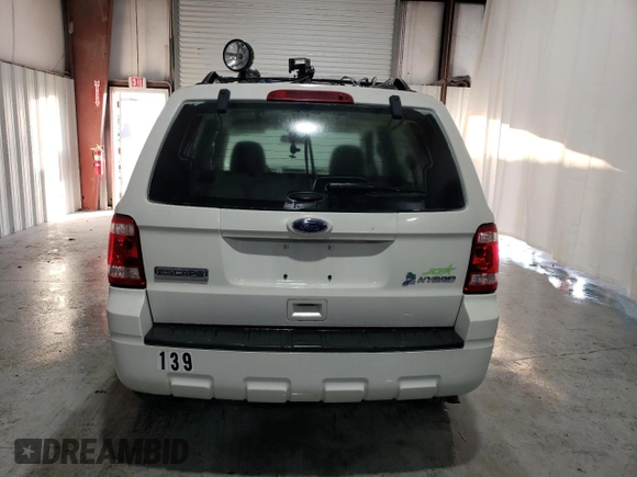 2011 Ford Escape Hybrid with VIN 1FMCU4K35BKC23461, listed as a Copart auction lot 73209354 with 3,888 mi miles and Clean title. Bid and sale history available at DreamBid. Image 6.