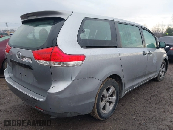 2012 Toyota Sienna with VIN 5TDZK3DC2CS221981, listed as a IAAI auction lot 41650273 with 146,652 mi miles. Bid and sale history available at carsss.com. Image 4.