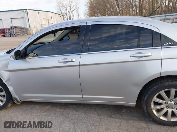 2012 Chrysler 200 Touring with VIN 1C3CCBBB8CN210825, listed as a IAAI auction lot 41828224 with 129,966 mi miles. Bid and sale history available at carsss.com. Image 14.