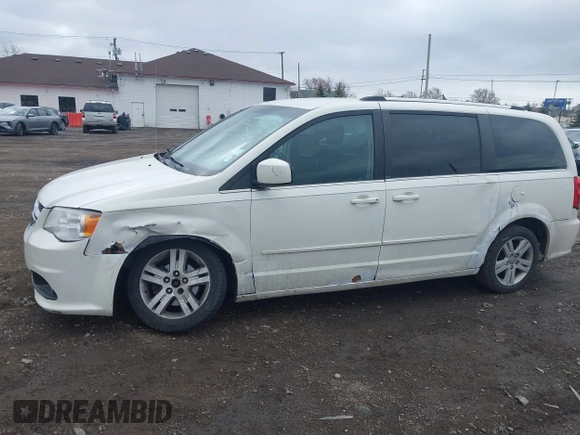 2011 Dodge Grand Caravan Crew with VIN 2D4RN5DGXBR711925, listed as a IAAI auction lot 41880154 with 156,016 mi miles and . Bid and sale history available at DreamBid. Image 6.