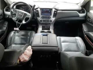 2019 GMC Yukon XL SLT with VIN 1GKS1GKC9KR288660, listed as a Copart auction lot 49669365 with 77,485 mi miles and Salvage Title. Bid and sale history available at carsss.com. Image 8.