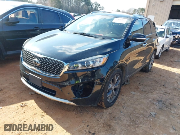 2018 Kia Sorento SX with VIN 5XYPKDA57JG349078, listed as a IAAI auction lot 41136917 with 119,213 mi miles and . Bid and sale history available at carsss.com. Image 2.