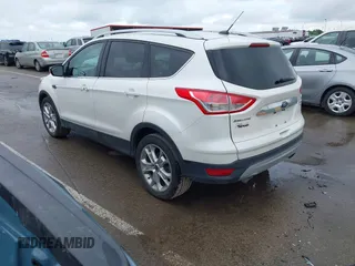 2016 Ford Escape Titanium with VIN 1FMCU9JX4GUB72080, listed as a IAAI auction lot 42519240 with 121,793 mi miles and . Bid and sale history available at DreamBid. Image 3.