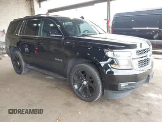 2015 Chevrolet Tahoe LT with VIN 1GNSKBKCXFR604401, listed as a IAAI auction lot 42048559 with 60,768 mi miles and . Bid and sale history available at DreamBid. Image 1.