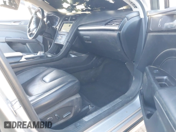 2017 Ford Fusion Hybrid Titanium with VIN 3FA6P0RU8HR190482, listed as a IAAI auction lot 41322244 with 137,539 mi miles and . Bid and sale history available at DreamBid. Image 5.
