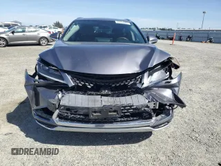 2020 Lexus RX 350L with VIN JTJHZKFA4L2027079, listed as a Copart auction lot 57151485 with 60,890 mi miles and Salvage title. Bid and sale history available at DreamBid. Image 5.