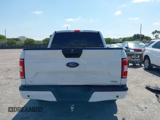 2018 Ford F-150 XL with VIN 1FTEW1CP8JKE91006, listed as a IAAI auction lot 42123840 with 76,806 mi miles and . Bid and sale history available at DreamBid. Image 17.