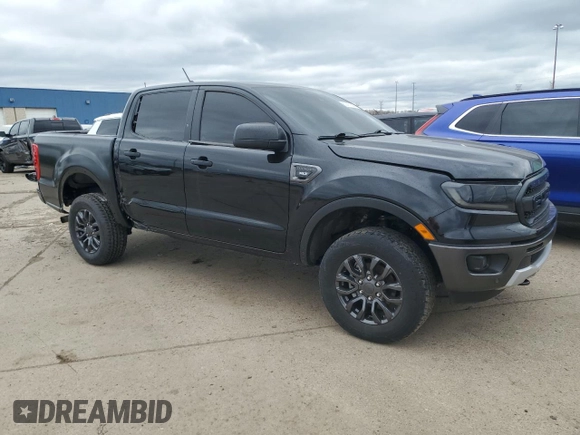 2023 Ford Ranger XL with VIN 1FTER4FH5PLE32303, listed as a Copart auction lot 52417505 with 26,392 mi miles and Salvage title. Bid and sale history available at DreamBid. Image 4.