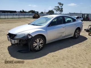 2012 Mazda 6 i Touring with VIN 1YVHZ8DH2C5M12963, listed as a Copart auction lot 60695835 with 100,200 mi miles and Salvage title. Bid and sale history available at DreamBid. Image 1.
