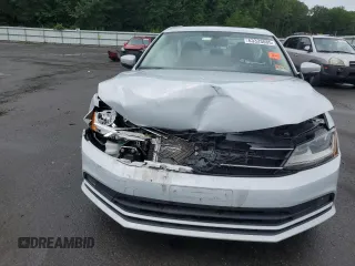 2017 Volkswagen Jetta SEL z VIN 3VWL17AJ6HM412147, wystawiony jako Copart lot #63333085 z przebiegiem Nie podano mil oraz Szkoda całkowita • Salvage title. Historia ofert i sprzedaży dostępna na DreamBid. Obrazek 5.