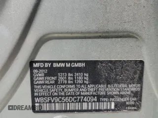 2013 BMW M5 z VIN WBSFV9C56DC774094, wystawiony jako Copart lot #55302565 z przebiegiem 100 605 mil mil oraz Tytuł czysty. Historia ofert i sprzedaży dostępna na DreamBid. Obrazek 13.