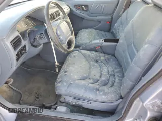 1995 Buick Regal Custom с VIN 2G4WB52L9S1442500, выставлен на аукционе Copart как лот 77215904 с пробегом 72 414 миль миль и Списание • Salvage title. История ставок и продаж доступна на DreamBid. Изображение 7.