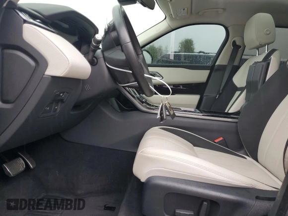 2019 Land Rover Range Rover Velar R-Dynamic SE с VIN SALYL2EX1KA228994, выставлен на аукционе Copart как лот 63662895 с пробегом 56 504 миль миль и Списание • Salvage title. История ставок и продаж доступна на DreamBid. Изображение 7.