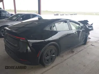 2024 Toyota Prius LE with VIN JTDACAAU3R3032357, listed as a IAAI auction lot 41914598 with 15,360 mi miles and . Bid and sale history available at DreamBid. Image 4.