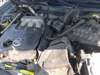 2002 Nissan Maxima GXE z VIN JN1DA31D62T444053, wystawiony jako IAAI lot #42307859 z przebiegiem Nie podano mil oraz . Historia ofert i sprzedaży dostępna na DreamBid. Obrazek 10.