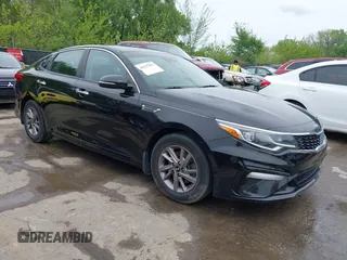 2020 Kia Optima LX with VIN 5XXGT4L34LG427476, listed as a IAAI auction lot 42117451 with 73,560 mi miles and . Bid and sale history available at DreamBid. Image 1.