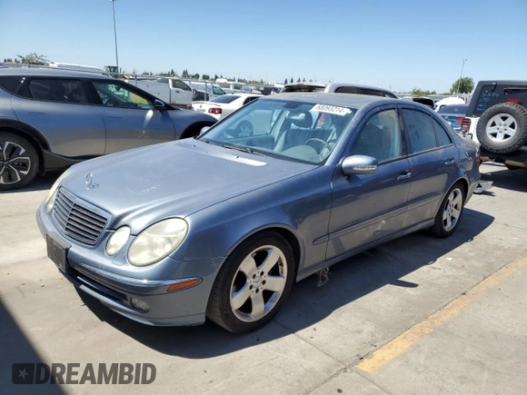 2004 Mercedes-Benz E-Class 5.0L with VIN WDBUF70JX4A479530, listed as a Copart auction lot 68093214 with 165,986 mi miles and Clean Title. Bid and sale history available at carsss.com. Image 1.