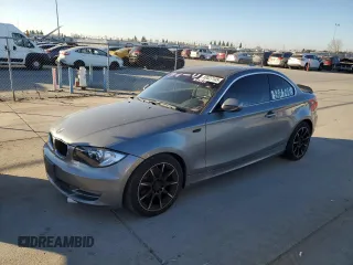 2011 BMW 1 Series 128i with VIN WBAUP9C59BVL90236, listed as a Copart auction lot 89027105 with 169,716 mi miles and Clean Title. Bid and sale history available at carsss.com. Image 1.
