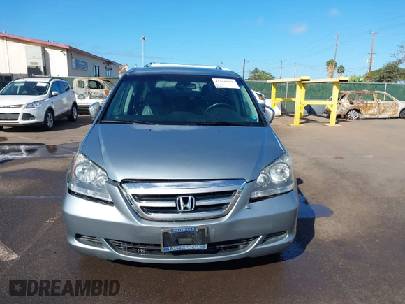 2007 Honda Odyssey EX-L with VIN 5FNRL38677B021464, listed as a IAAI auction lot 41568582 with 131,359 mi miles and . Bid and sale history available at DreamBid. Image 12.