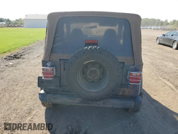 1997 Jeep Wrangler Sport with VIN 1J4FY19S0VP449796, listed as a Copart auction lot 74392904 with 139,322 mi miles and Clean Title. Bid and sale history available at carsss.com. Image 6.