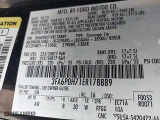 2014 Ford Fusion SE with VIN 3FA6P0H71ER178889, listed as a IAAI auction lot 41883131 with 236,447 mi miles. Bid and sale history available at carsss.com. Image 9.