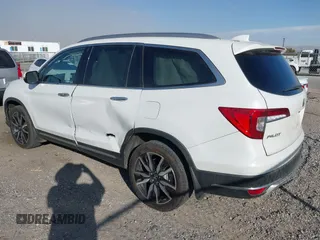 2022 Honda Pilot Touring 7-Passenger with VIN 5FNYF6H67NB017660, listed as a IAAI auction lot 41194603 with 87,301 mi miles. Bid and sale history available at carsss.com. Image 3.