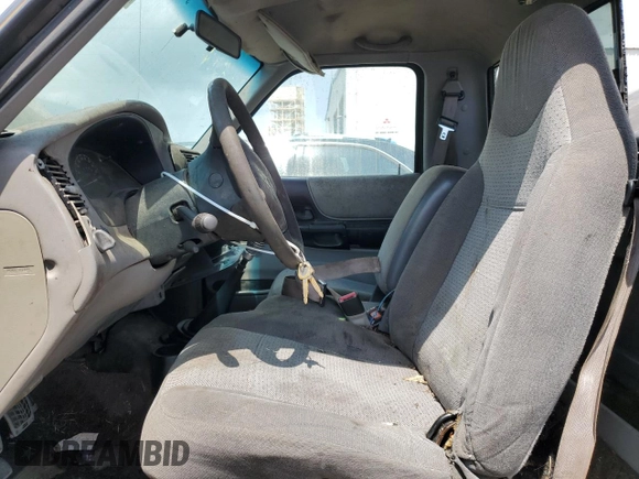 1999 Mazda B-Series 2WD Truck SX with VIN 4F4YR12C1XTM24843, listed as a Copart auction lot 46144364 with 346,188 mi miles and Salvage Title. Bid and sale history available at carsss.com. Image 7.