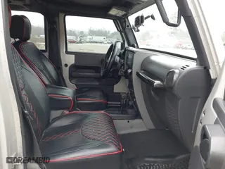 2007 Jeep Wrangler Unlimited X with VIN 1J4GA391X7L107424, listed as a IAAI auction lot 41752013 with 196,557 mi miles. Bid and sale history available at carsss.com. Image 5.