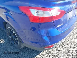 2013 Ford Focus SE z VIN 1FADP3F28DL178210, wystawiony jako IAAI lot #42199073 z przebiegiem 110 542 mil mil oraz . Historia ofert i sprzedaży dostępna na DreamBid. Obrazek 12.