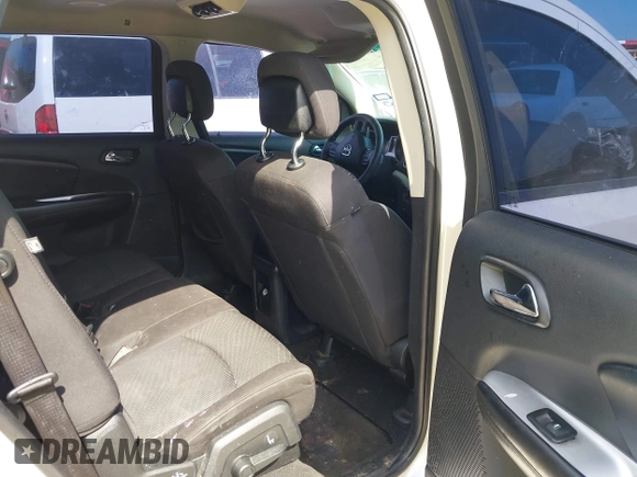 2013 Dodge Journey American Value with VIN 3C4PDCAB0DT723988, listed as a IAAI auction lot 42263191 with 205,014 mi miles and . Bid and sale history available at DreamBid. Image 8.