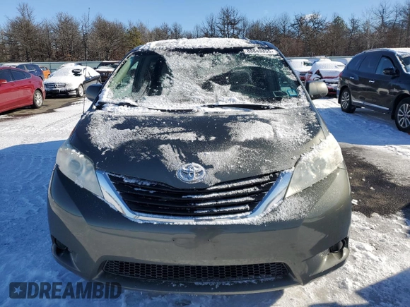 2012 Toyota Sienna LE AAS with VIN 5TDKK3DC2CS218077, listed as a Copart auction lot 88849855 with 208,853 mi miles and Clean Title. Bid and sale history available at carsss.com. Image 5.