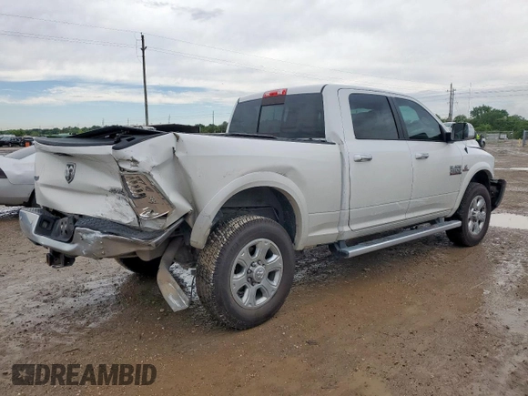 2016 Ram 2500 Laramie with VIN 3C6UR5FL2GG125021, listed as a Copart auction lot 58519995 with 123,055 mi miles and Salvage title. Bid and sale history available at DreamBid. Image 3.
