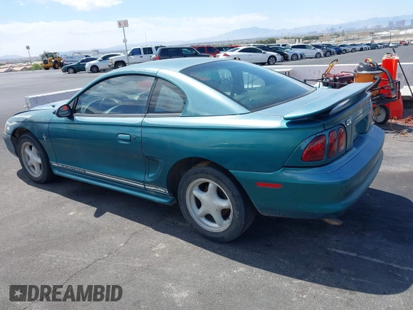 1997 Ford Mustang with VIN 1FALP4049VF200422, listed as a IAAI auction lot 42073947 with 157,937 mi miles. Bid and sale history available at carsss.com. Image 3.