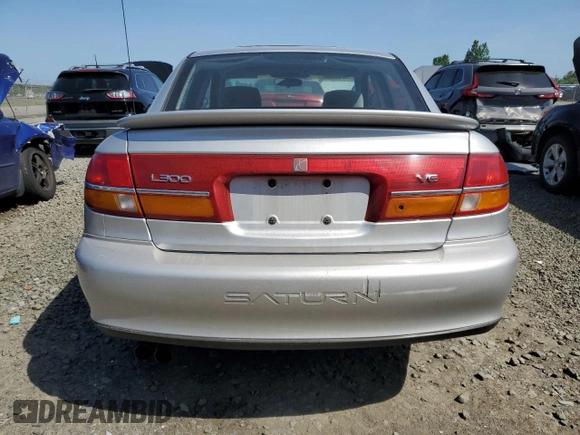 2002 Saturn LS z VIN 1G8JW54R92Y518857, wystawiony jako Copart lot #54855265 z przebiegiem 192 298 mil mil oraz Szkoda całkowita • Salvage title. Historia ofert i sprzedaży dostępna na DreamBid. Obrazek 6.