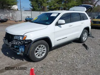 2018 Jeep Grand Cherokee Laredo E with VIN 1C4RJEAG3JC300760, listed as a IAAI auction lot 41811734 with 131,406 mi miles. Bid and sale history available at carsss.com. Image 18.
