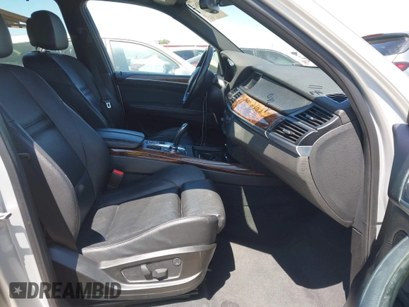2012 BMW X5 35d with VIN 5UXZW0C58CL671141, listed as a IAAI auction lot 42644381 with 127,464 mi miles and . Bid and sale history available at DreamBid. Image 5.