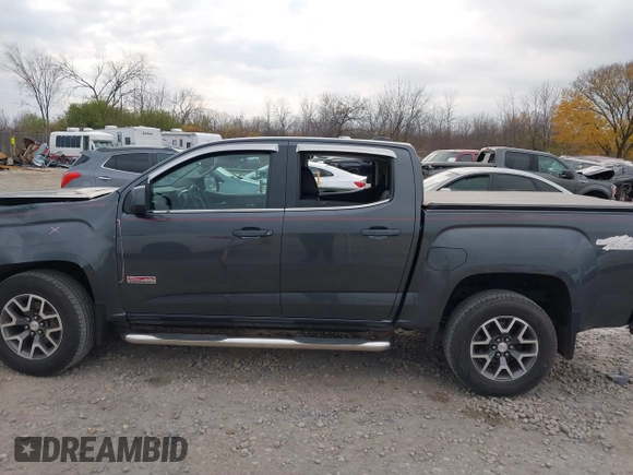 2016 GMC Canyon 4WD SLE with VIN 1GTG6CE38G1165896, listed as a IAAI auction lot 40716621 with 116,684 mi miles. Bid and sale history available at carsss.com. Image 14.