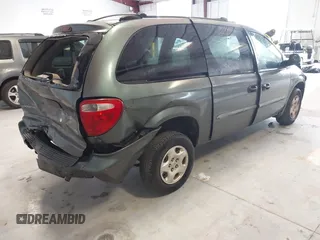 2003 Dodge Caravan SE with VIN 1D4GP24313B191319, listed as a IAAI auction lot 41398477 with 220,083 mi miles. Bid and sale history available at carsss.com. Image 4.