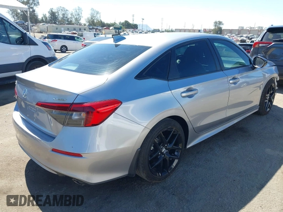 2023 Honda Civic Sport with VIN 2HGFE2F56PH500505, listed as a IAAI auction lot 42239112 with 39,513 mi miles and . Bid and sale history available at DreamBid. Image 4.