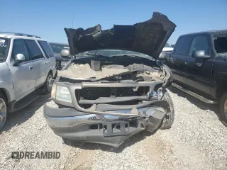 2002 Ford F-150 XL with VIN 1FTRX17L22NA48307, listed as a Copart auction lot 74238074 with 80,010 mi miles and Salvage title. Bid and sale history available at DreamBid. Image 5.