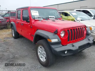 2020 Jeep Gladiator Sport S z VIN 1C6HJTAG6LL129268, wystawiony jako IAAI lot #42164605 z przebiegiem 57 215 mil mil oraz . Historia ofert i sprzedaży dostępna na DreamBid. Obrazek 1.