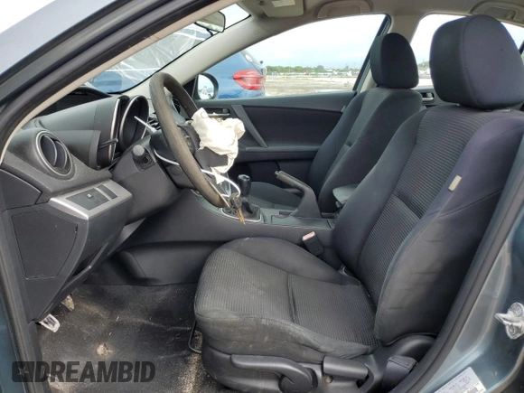 2012 Mazda 3 i Sport with VIN JM1BL1UF7C1634859, listed as a Copart auction lot 77349494 with 126,248 mi miles and Salvage Title. Bid and sale history available at DreamBid. Image 7.